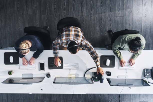 high angle shot of a group of call centre agents working in an office